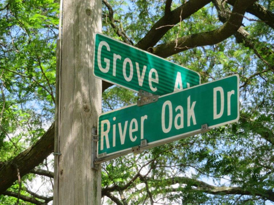 River Oak and Grove sign